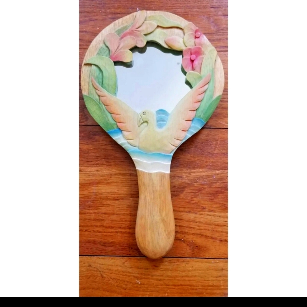 Hand held mirror